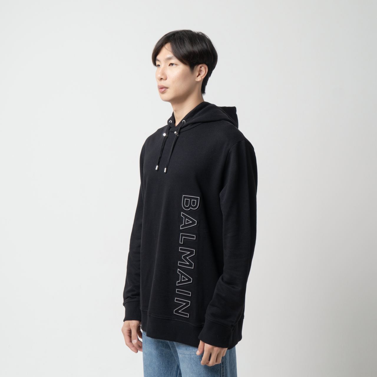 Balmain Vertical Embossed Logo Hoodie Black – voilà.id
