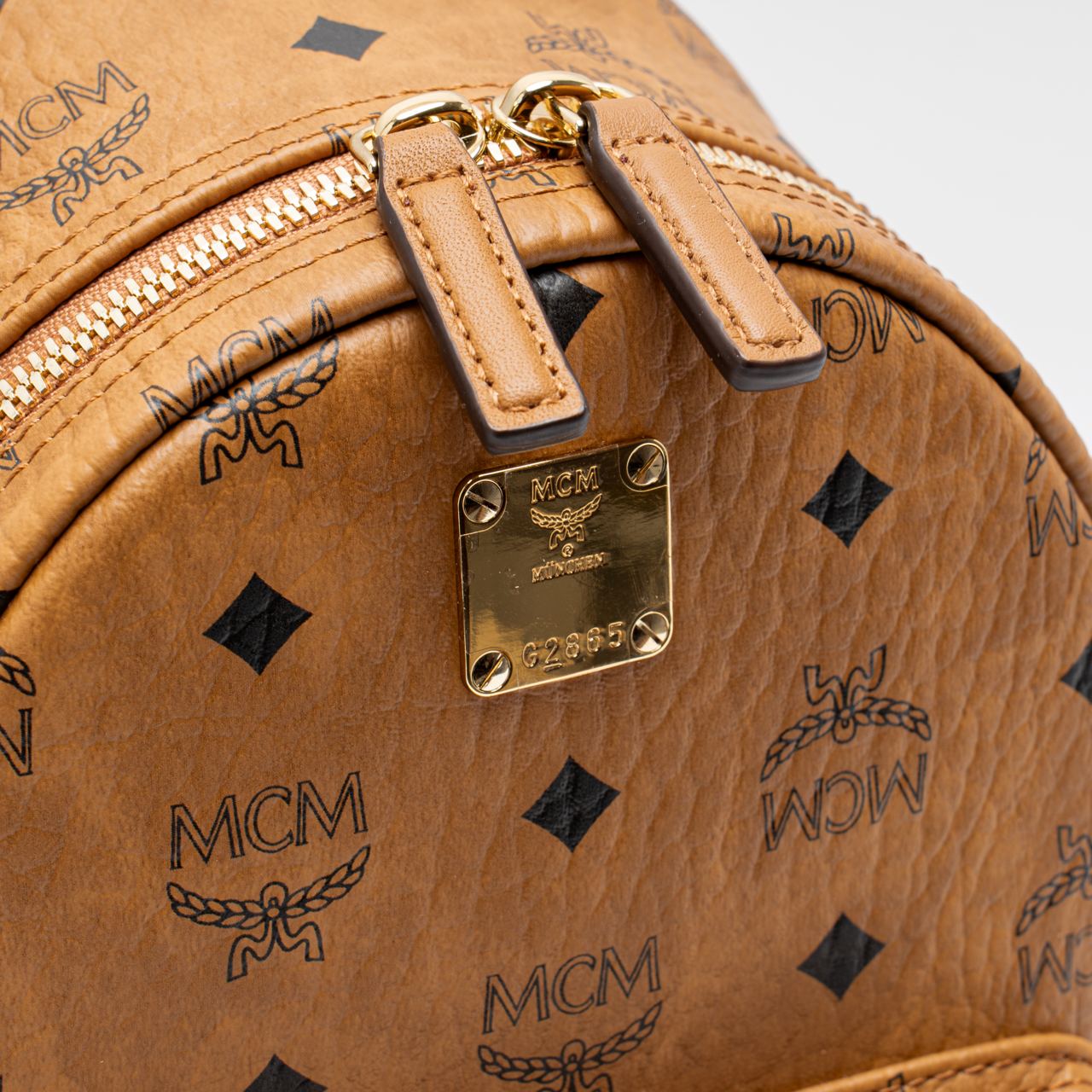 MCM Stark Side Studs Mini Backpack Visetos Cognac – voilà.id