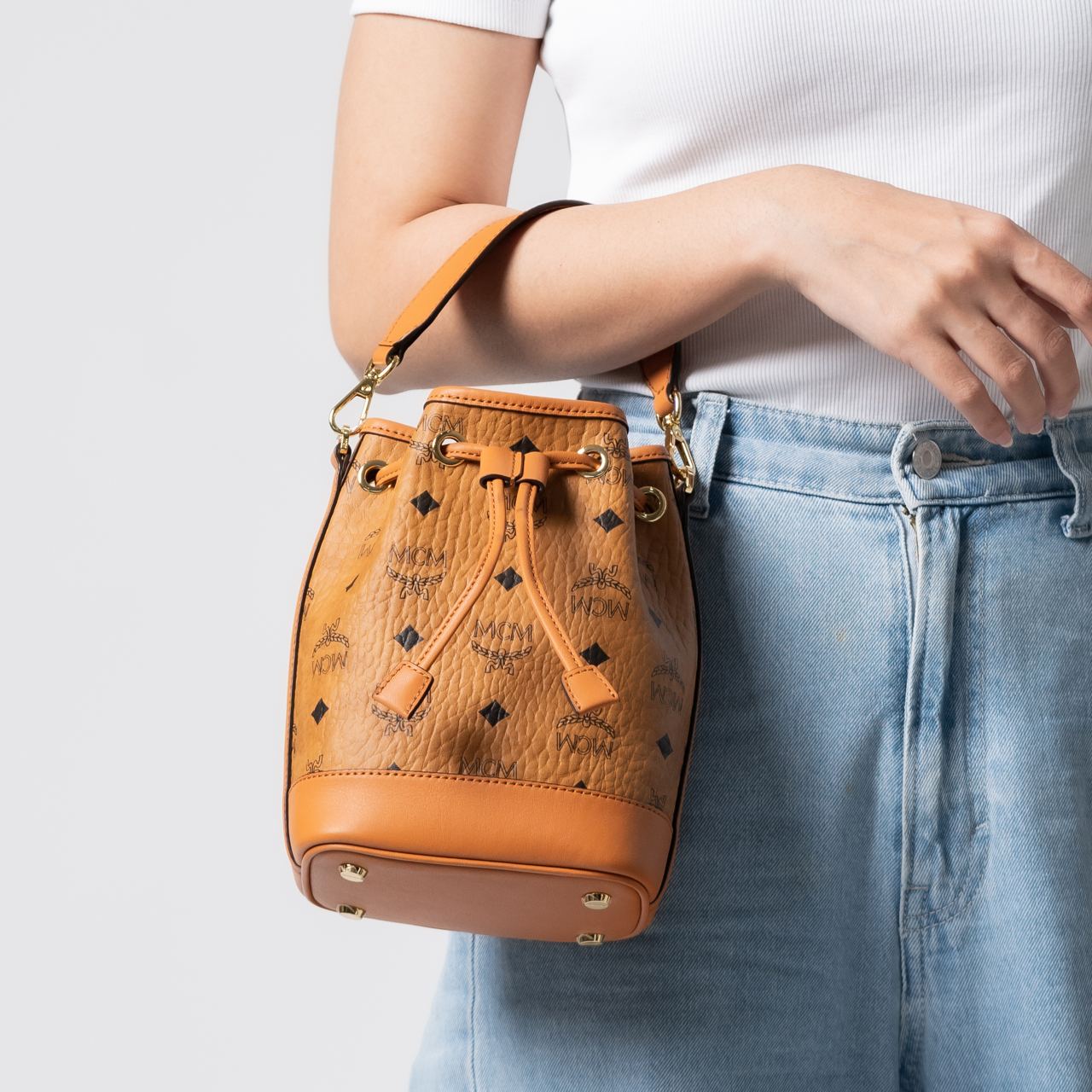 MCM Mini Dessau Drawstring Bag in Visetos Cognac – voilà.id