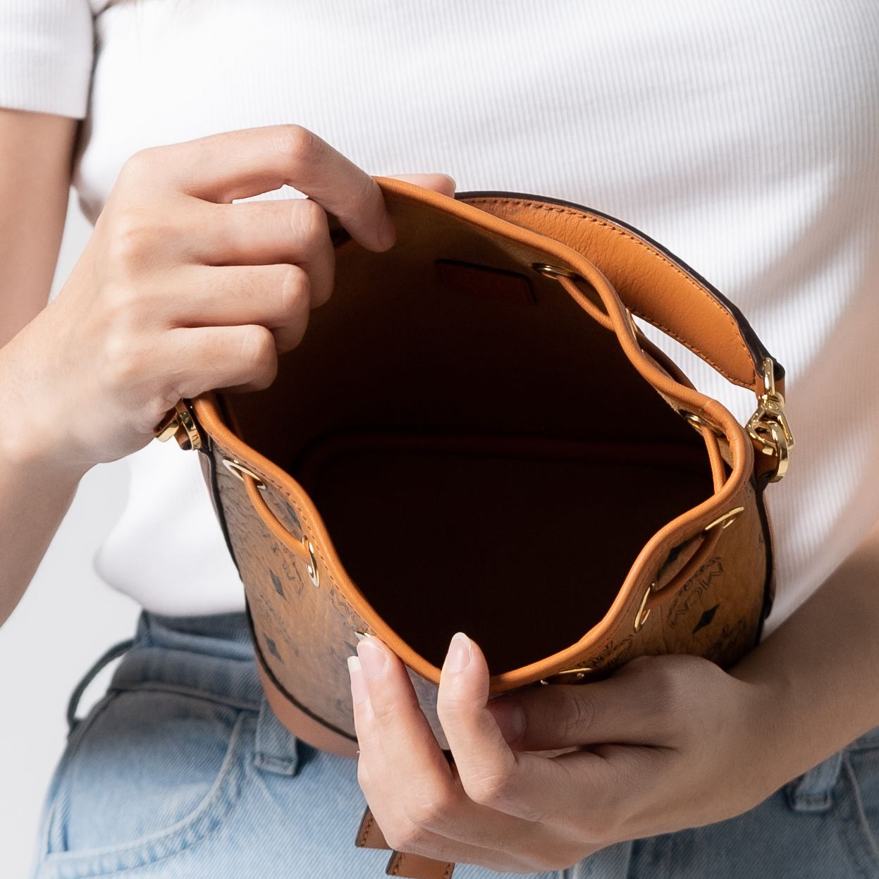 MCM Mini Dessau Drawstring Bag in Visetos Cognac – voilà.id