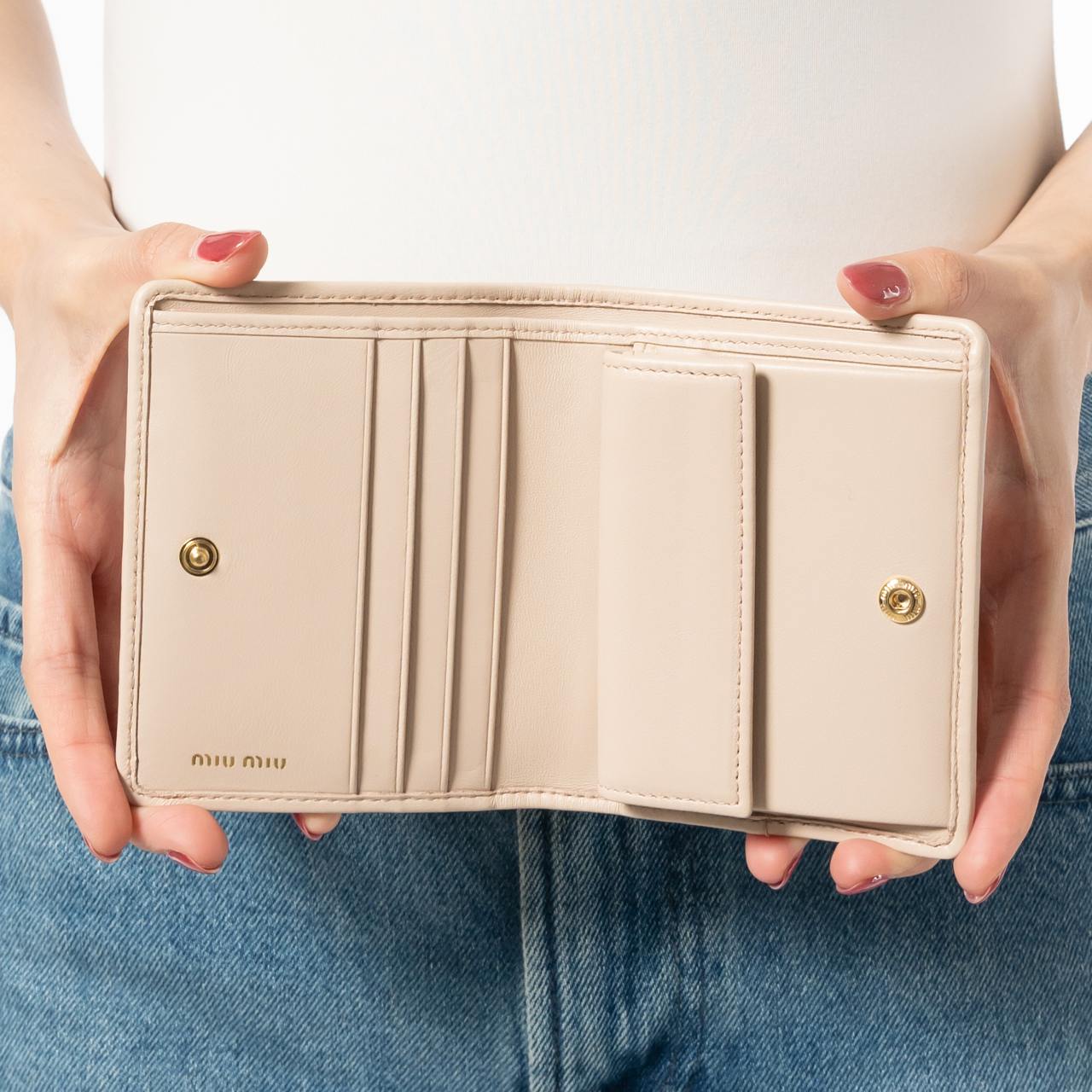 【MIUMIU】nappa leather bi-fold wallet（関税込み） Miu Miu Small Nappa Leather Wallet - Black | Editorialist