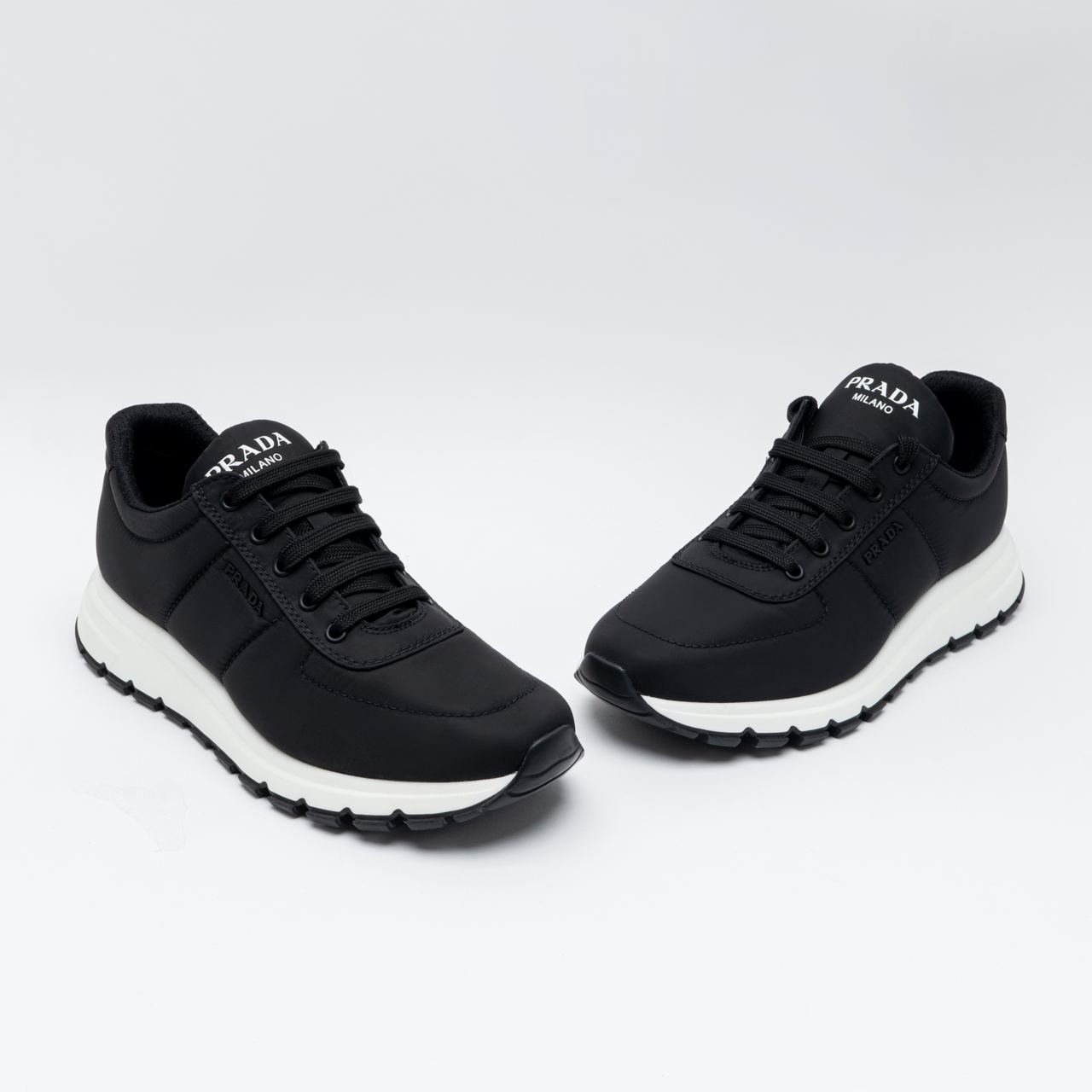 Prada Nylon Piuma with Logo Plaque Trainer Sneakers Black/White