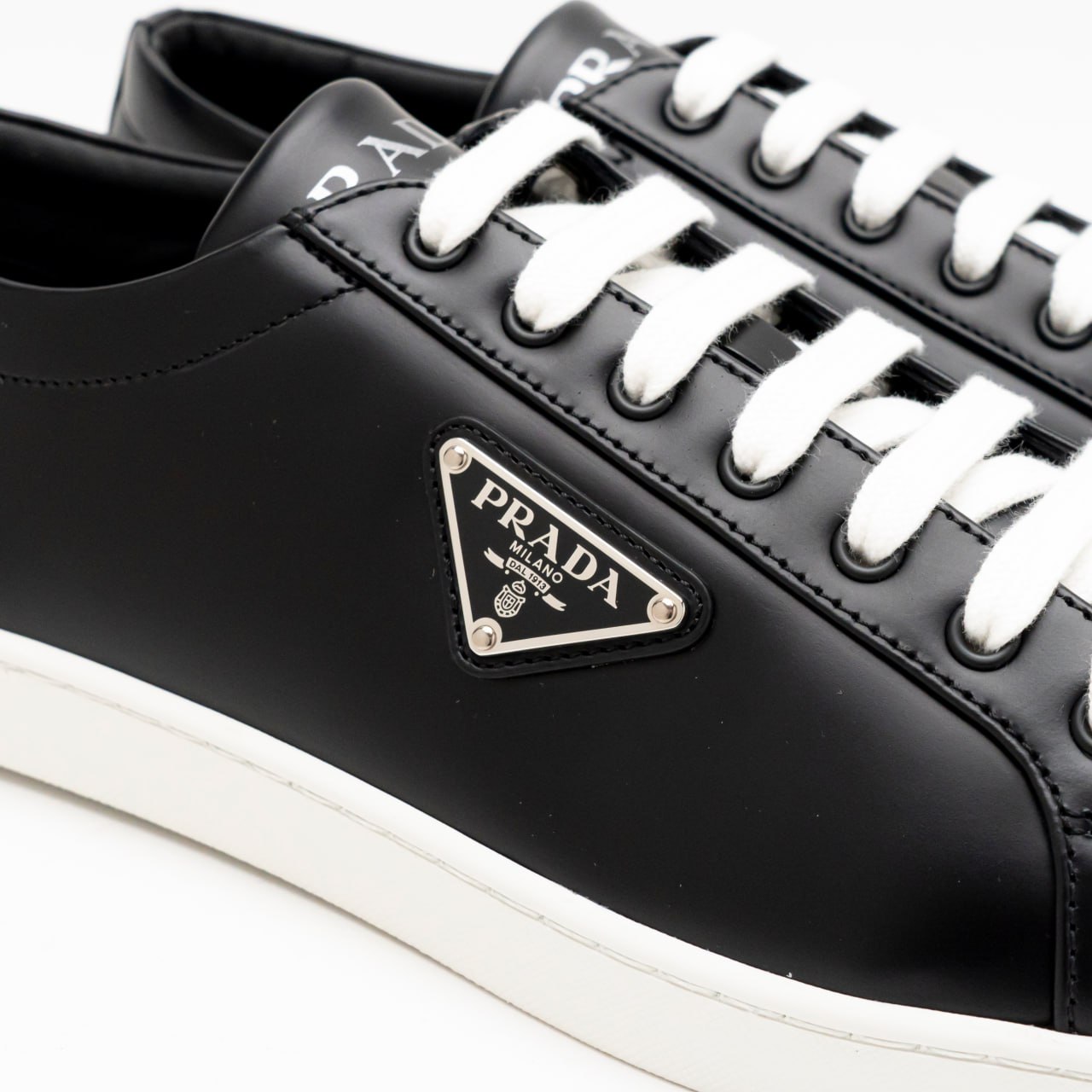Prada Enameled Triangle Logo Brushed Leather Sneakers Black