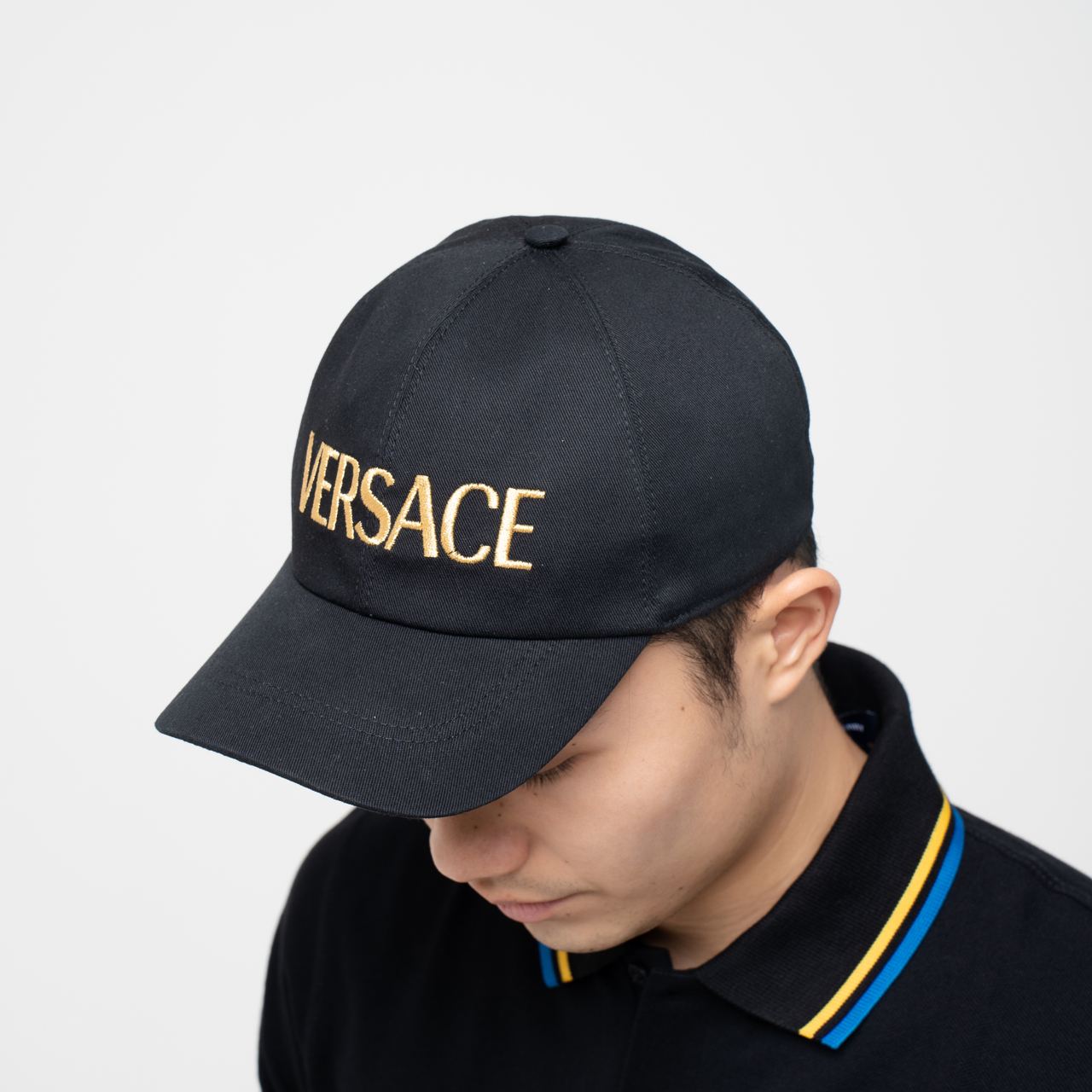 Versace Embroidered Logo Baseball Cap Black Gold – voilà.id